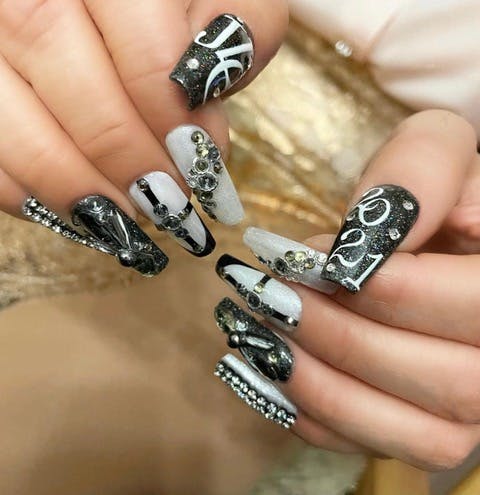 Get The Look J Lo S Sparkling Black And White Nails Nailpro Get The Look J Lo S Sparkling Black And White Nails Nailpro