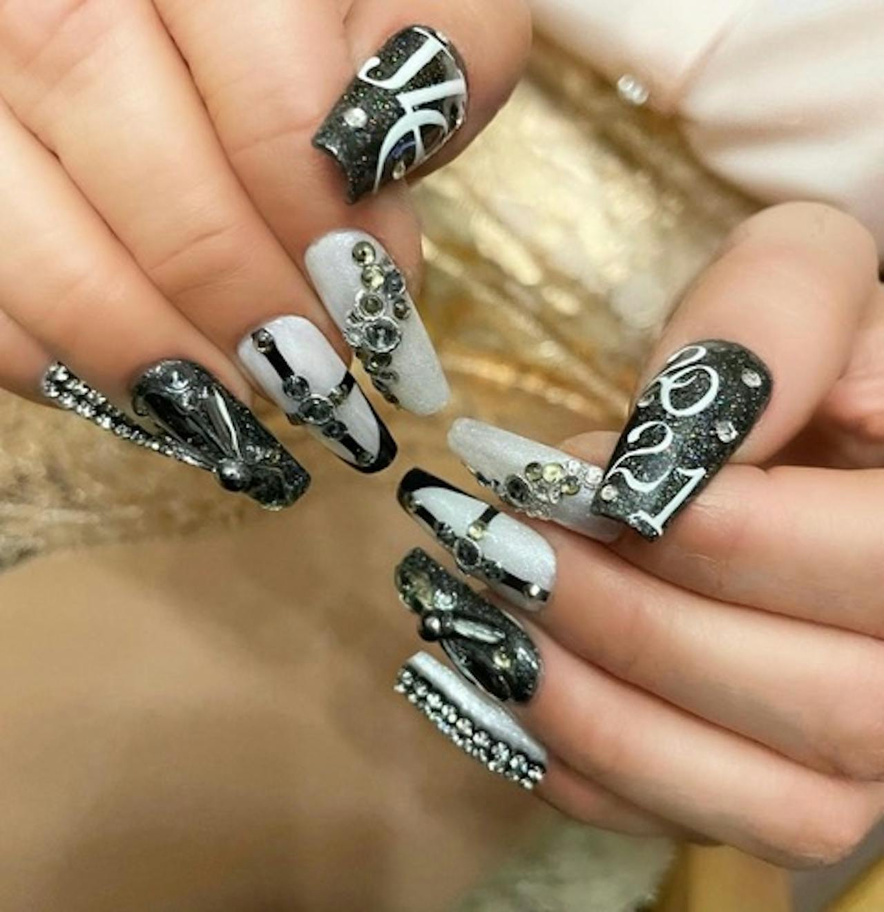 Get The Look J Lo S Sparkling Black And White Nails Nailpro