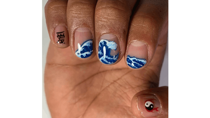 Negative-space nails, courtesy of @ByMizzBlac on Instagram