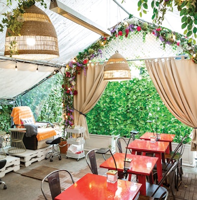 Lili and Cata's in Brooklyn, NY offers an outdoor garden spa for clients to receive manicures and pedicures.